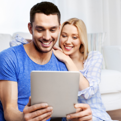 Couple applying for VA home loan online.