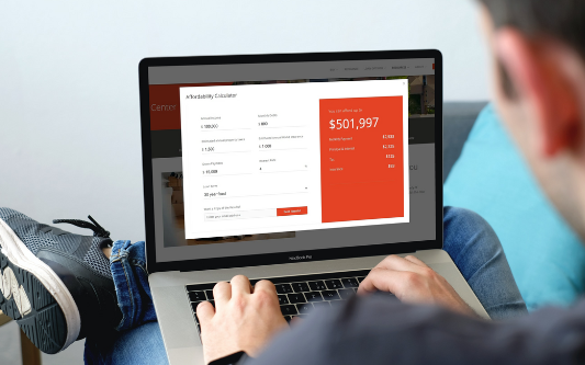 Nathan Mortgage customer using their laptop to determine affordability with a trusted local lender.